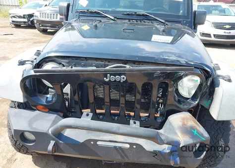 2013 Jeep Wrangler Unlimited Sport z USA, uszkodzony, nr VIN 1C4BJWDG1DL577527